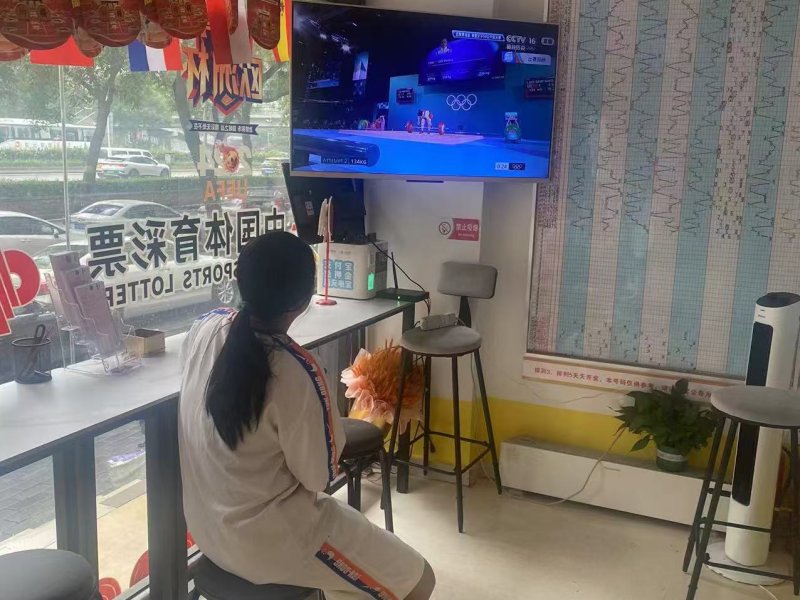 彩票店销售看奥运.png